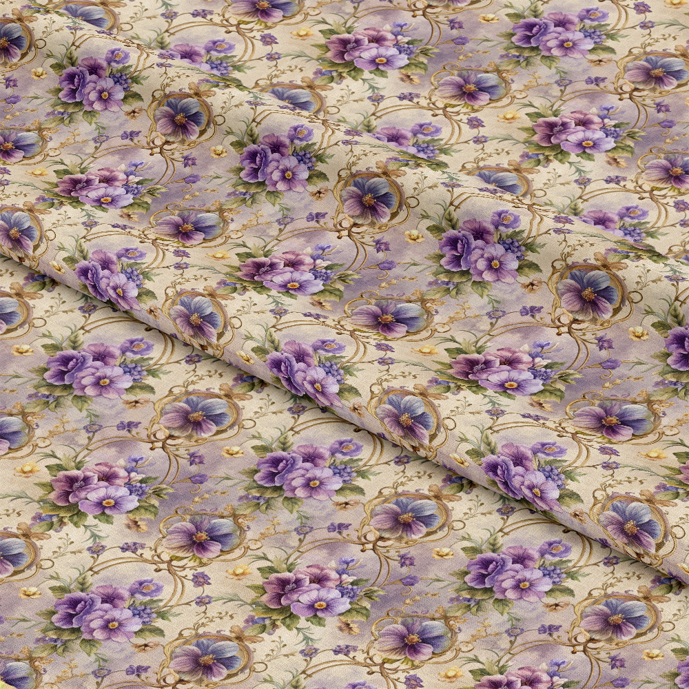 A close-up of fabric with a repeating pattern of purple and lavender flowers, green leaves, and gold accents on a beige background. The fabric is folded, showing the continuous floral design.