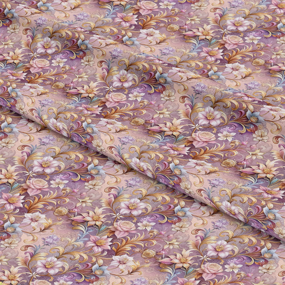 A close-up of fabric with an ornate floral pattern featuring pink, purple, and cream flowers with gold accents and swirling leaves on a mauve background. The fabric appears slightly folded.