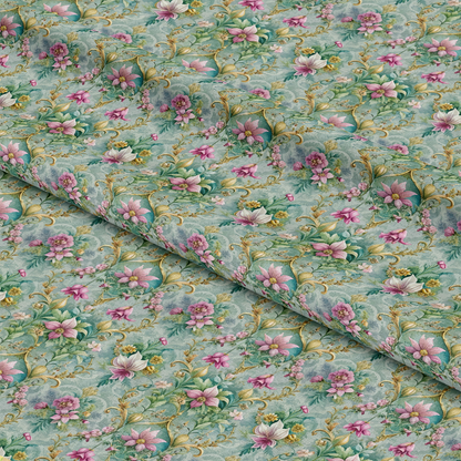 A close-up of patterned fabric with a repeating floral design featuring pink, white, and purple flowers with green vines and leaves on a light blue background. The fabric is slightly folded.