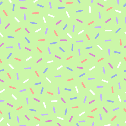 rainbow sprinkles, colorful dashes, green background, lime green, pastel colors, pink sprinkles, blue sprinkles, white sprinkles, coral sprinkles, purple sprinkles, scattered pattern, confetti design, sweet treats, bakery theme, cheerful mood, whimsical style, quilting cotton, fabric panel, bright colors, playful pattern