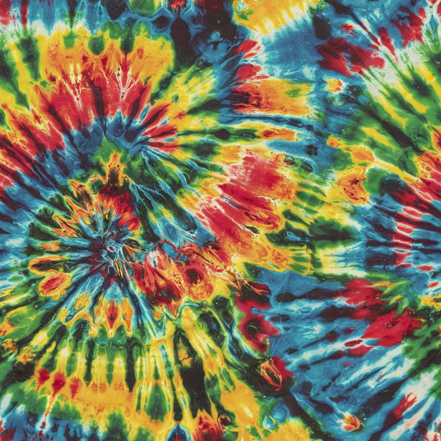 tie dye, rainbow colors, psychedelic swirls, retro pattern, vibrant hues, red, blue, yellow, green, spiral design, burst pattern, radial motifs, cotton fabric, quilting panel, 1960s style, hippie aesthetic, kaleidoscope effect, color bleeding, abstract design, fabric panel