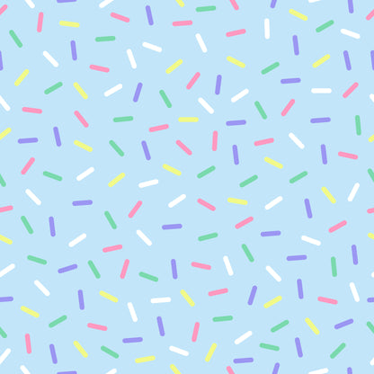 rainbow sprinkles, multicolored confetti, candy sprinkles, pastel blue background, pink sprinkles, purple sprinkles, yellow sprinkles, green sprinkles, white sprinkles, scattered pattern, random placement, sweet treats, bakery theme, dessert motif, quilting cotton, fabric panel, cheerful mood, playful design, birthday theme, celebration pattern