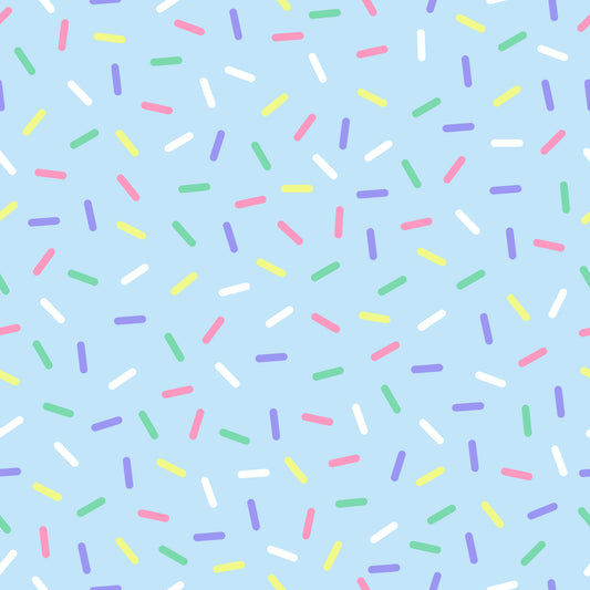 rainbow sprinkles, multicolored confetti, candy sprinkles, pastel blue background, pink sprinkles, purple sprinkles, yellow sprinkles, green sprinkles, white sprinkles, scattered pattern, random placement, sweet treats, bakery theme, dessert motif, quilting cotton, fabric panel, cheerful mood, playful design, birthday theme, celebration pattern