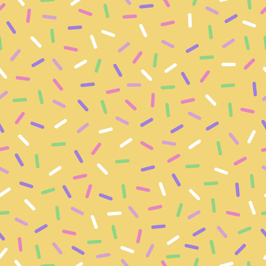 yellow background, rainbow sprinkles, colorful confetti, pink sprinkles, purple sprinkles, green sprinkles, white sprinkles, blue sprinkles, scattered pattern, random placement, cheerful design, playful mood, quilting cotton, fabric panel, baking theme, dessert motif, bright colors, festive pattern, sweet treats, candy colors