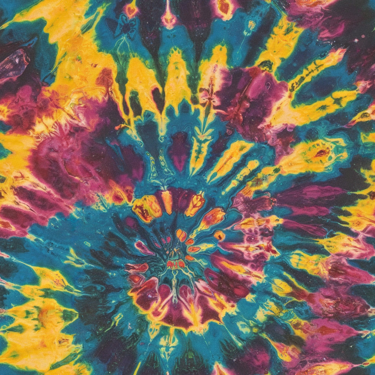 teal blue, bright yellow, magenta pink, purple, tie dye, psychedelic pattern, retro style, radiating design, burst pattern, vibrant colors, groovy aesthetic, 1960s inspired, quilting cotton, fabric panel, swirling motifs, kaleidoscope effect, hippie style, abstract design, colorful explosion, sixties vibe