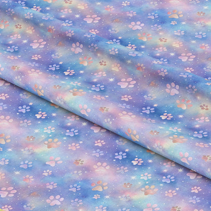 - Dog Paws Pattern 10 Quilting Cotton Fabric  
- pastel colors  
- blue  
- lavender  
- peach  
- light purple  
- soft cotton  
- quilting fabric  
- paw prints  
- whimsical  
- playful  
- multi-colored  
- textile  
- sewing material  
- craft fabric
