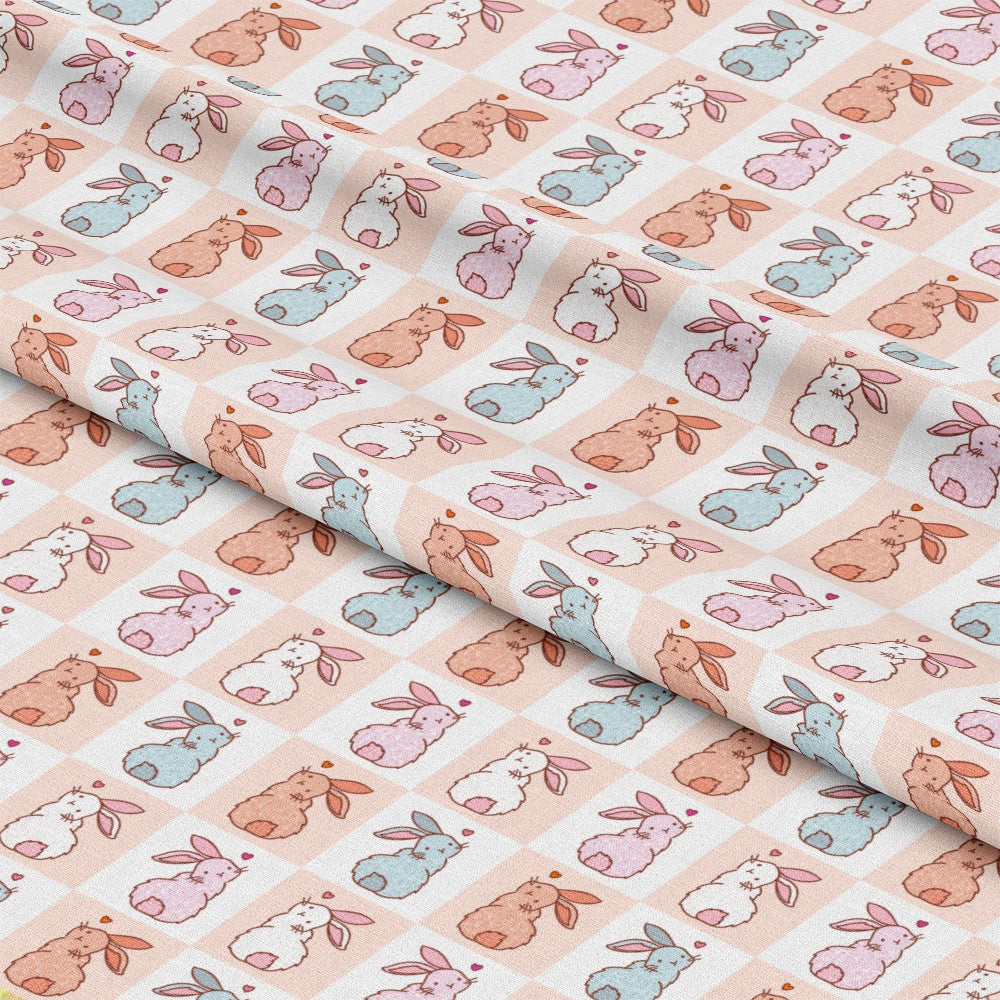- Cute Easter Bunnies Checkered Pattern 1 Quilting Cotton Fabric - pastel colors - pink - blue - beige - brown - white - soft texture - small squares - bunny illustrations - quilting fabric - cotton material - sewing fabric - spring theme - delicate design - lightweight fabric