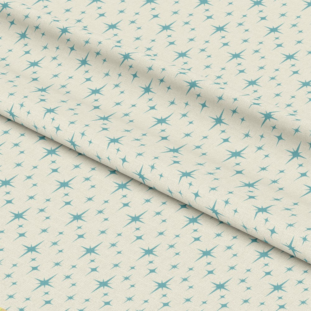 - Atomic Starbursts Pattern 1 Quilting Cotton Fabric  
- light beige background  
- teal starburst motifs  
- abstract star shapes  
- soft textile  
- cotton material  
- quilting fabric  
- decorative textile  
- subtle retro design  
- delicate geometric print
