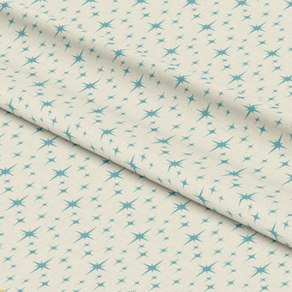 - Atomic Starbursts Pattern 1 Quilting Cotton Fabric  
- light beige background  
- teal starburst motifs  
- abstract star shapes  
- soft textile  
- cotton material  
- quilting fabric  
- decorative textile  
- subtle retro design  
- delicate geometric print