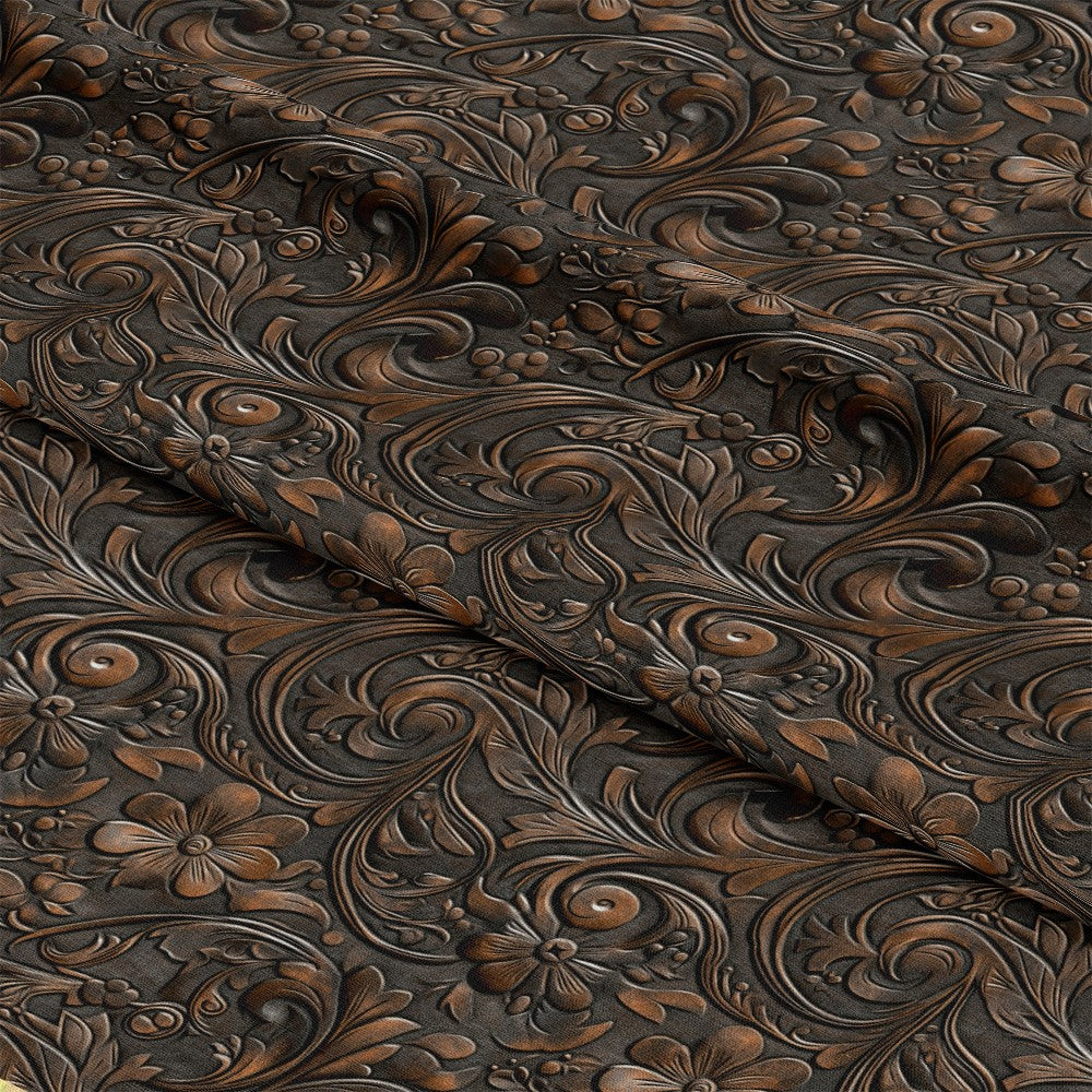 The Western Life Pattern 14 Quilting Cotton Fabric, embossed floral design, swirling leaves, dark brown, tan, leather texture appearance, rustic style, decorative fabric, cotton material, quilting textile, western inspired, natural tones, intricate craftsmanship, ornamental foliage, vintage Western aesthetic, upholstery fabric alternative, soft cotton cloth.