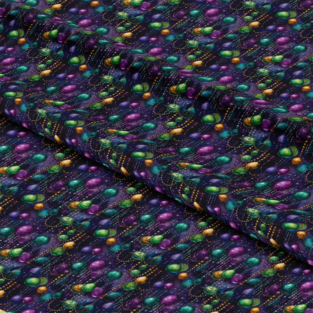 - French Quarter Mardi Gras Pattern 7 Quilting Cotton Fabric  
- Mardi Gras beads  
- Green, purple, gold colors  
- Festive design  
- Quilting fabric  
- Cotton material  
- Yardage fabric  
- Colorful texture  
- Decorative textile  
- Carnival inspired